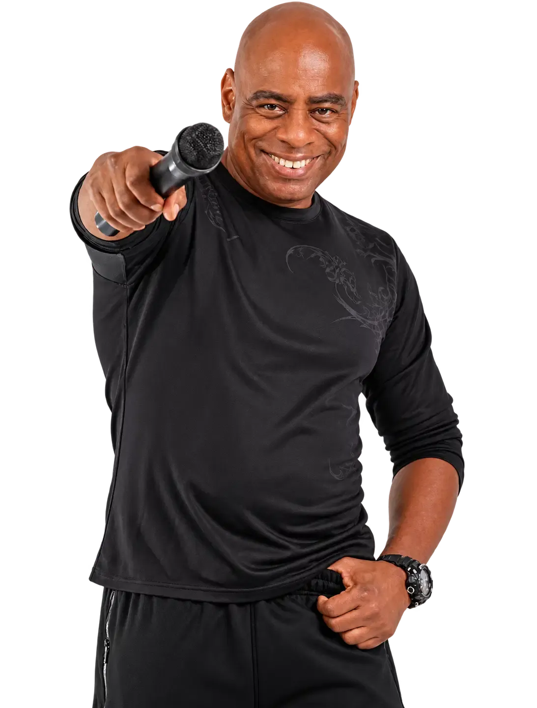 JAY the Sing-a-median smiling and pointing a microphone toward the camera